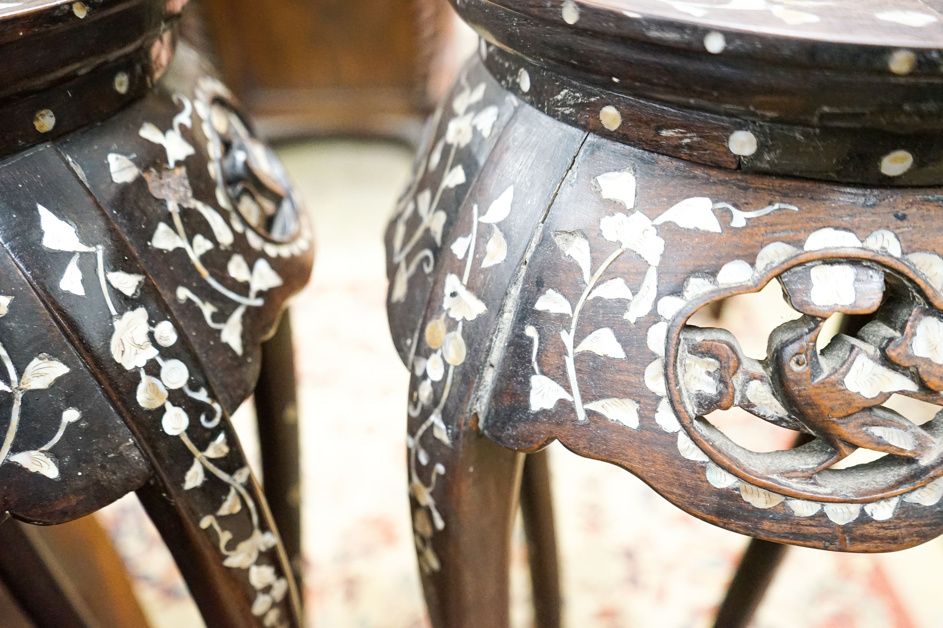 A pair of Chinese mother of pearl inset hardwood vase stands, height 92cm